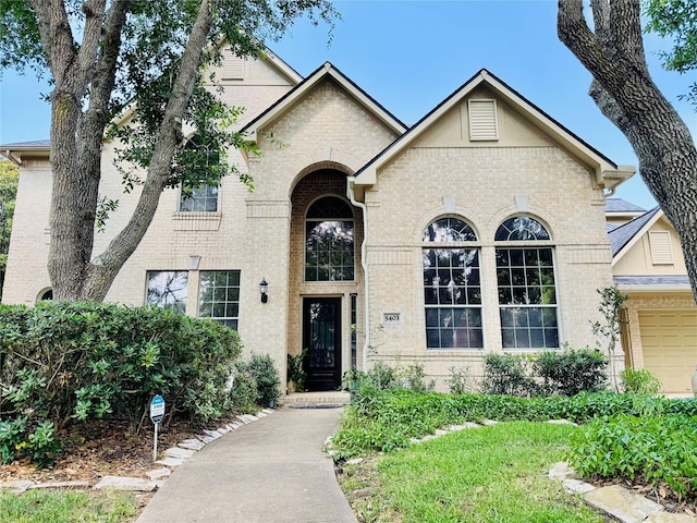 5403 Emerald Pointe Ln, Sugar Land, TX 77479 - view of front facade featuring brick siding