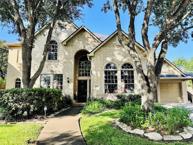 5403 Emerald Pointe Ln, Sugar Land, TX 77479 - view of front of house with brick siding and a garage