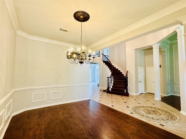 5403 Emerald Pointe Ln, Sugar Land, TX 77479 - tiled spare room with ornamental molding, decorative columns, a chandelier, and stairs