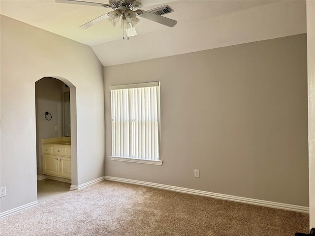 5403 Emerald Pointe Ln, Sugar Land, TX 77479 - spare room with light colored carpet, arched walkways, ceiling fan, and vaulted ceiling