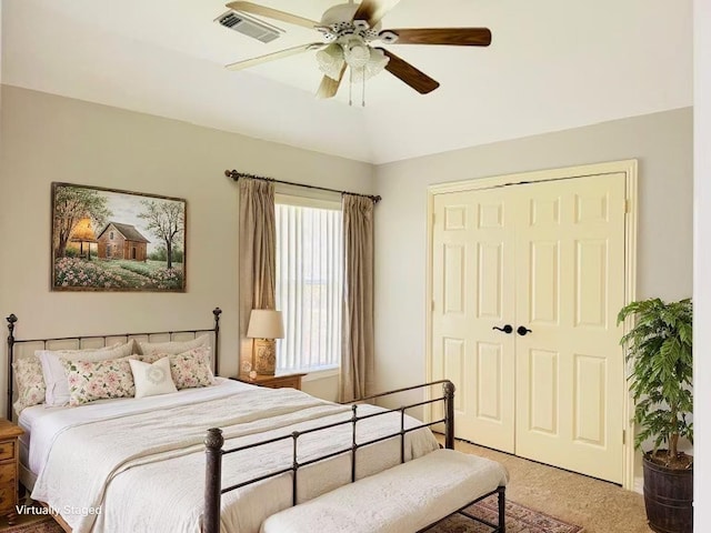 5403 Emerald Pointe Ln, Sugar Land, TX 77479 - bedroom with light carpet, a closet, a ceiling fan, and vaulted ceiling