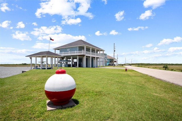 1301 Lagoon Dr, Crystal Beach, TX 77650 - view of property's community with a lawn and a water view