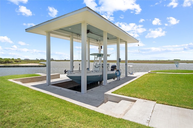1301 Lagoon Dr, Crystal Beach, TX 77650 - dock area with a water view, a lawn, and boat lift