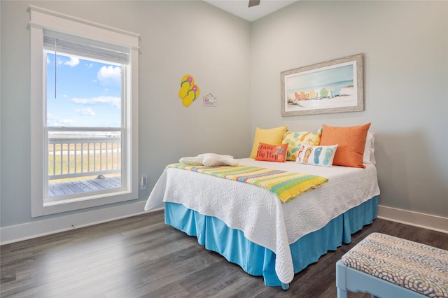 1301 Lagoon Dr, Crystal Beach, TX 77650 - bedroom with wood finished floors and ceiling fan