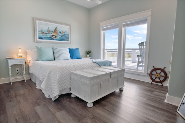 1301 Lagoon Dr, Crystal Beach, TX 77650 - bedroom featuring access to outside and dark wood-style flooring