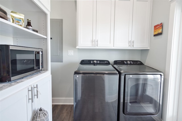 1301 Lagoon Dr, Crystal Beach, TX 77650 - laundry room with independent washer and dryer, electric panel, dark wood-style floors, and cabinet space