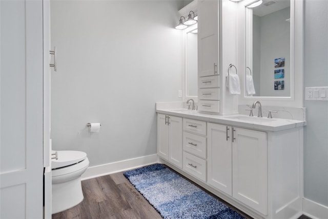 1301 Lagoon Dr, Crystal Beach, TX 77650 - bathroom with double vanity and wood finished floors