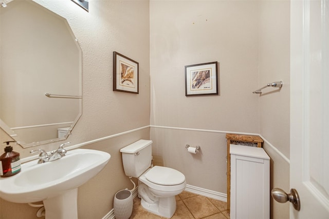 23702 Whispering Wind, Katy, TX 77494 - half bathroom featuring a sink and tile patterned floors