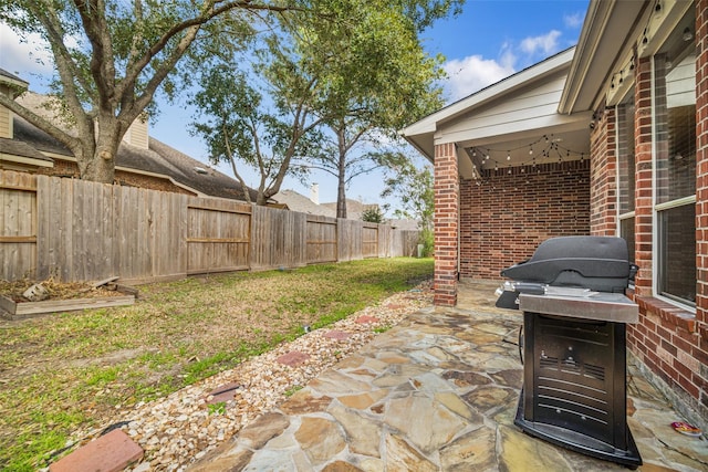 23702 Whispering Wind, Katy, TX 77494 - fenced backyard with area for grilling and a patio area