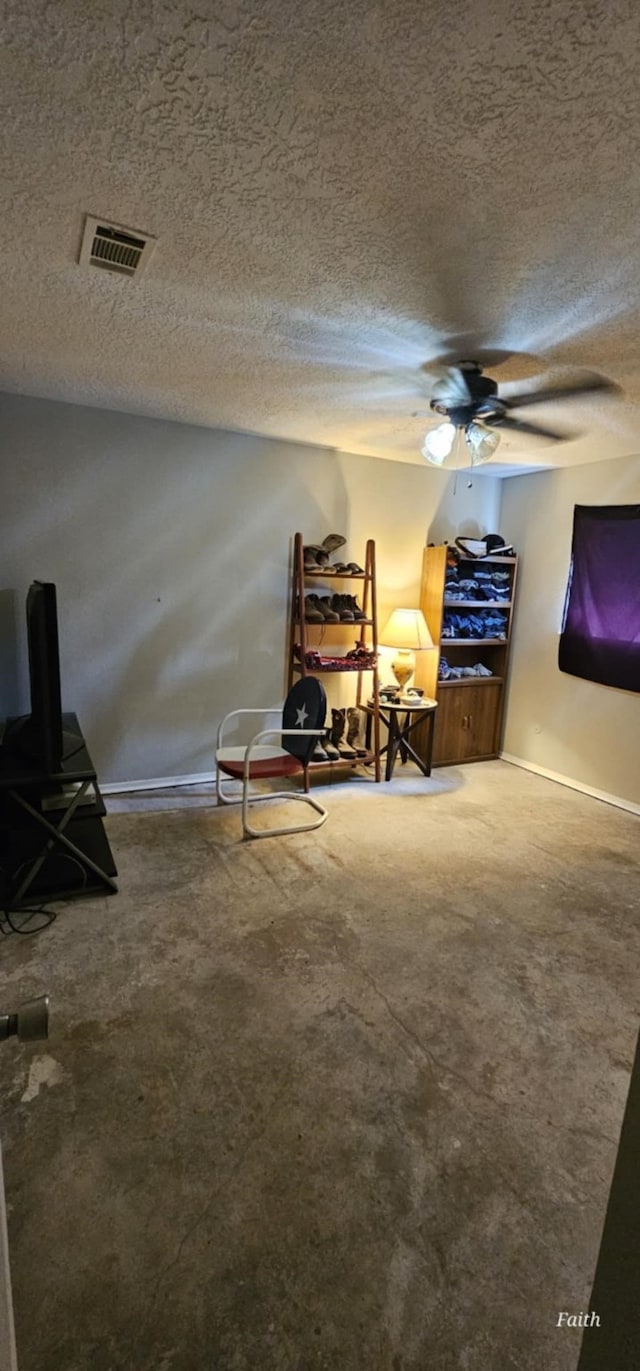 2714 6th Ave N, Texas City, TX 77590 - sitting room featuring a textured ceiling, ceiling fan, and carpet