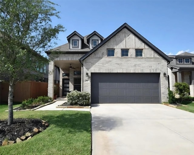 917 Crystal Bend Ln, Katy, TX 77493 - view of front of house featuring concrete driveway, brick siding, and an attached garage