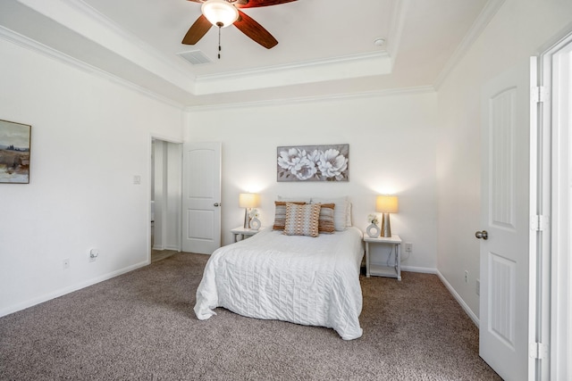 16070 Deer Pines Dr, Conroe, TX 77303 - carpeted bedroom featuring ornamental molding, a tray ceiling, and ceiling fan