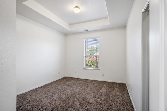 16070 Deer Pines Dr, Conroe, TX 77303 - carpeted spare room featuring baseboards and a tray ceiling