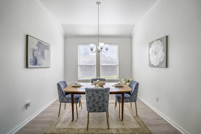 16070 Deer Pines Dr, Conroe, TX 77303 - dining space featuring crown molding, wood finished floors, and a chandelier