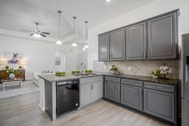 16070 Deer Pines Dr, Conroe, TX 77303 - kitchen with dishwasher, arched walkways, and gray cabinetry