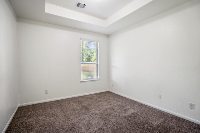 16070 Deer Pines Dr, Conroe, TX 77303 - carpeted empty room with baseboards and a tray ceiling