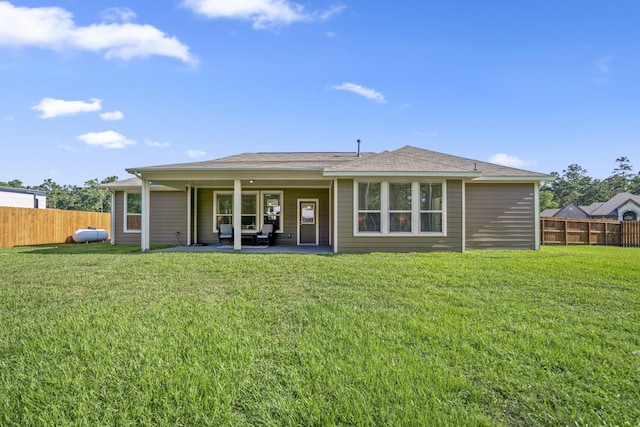 16070 Deer Pines Dr, Conroe, TX 77303 - rear view of house with a fenced backyard and a patio area
