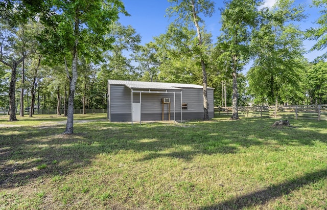 16070 Deer Pines Dr, Conroe, TX 77303 - view of yard with an outdoor structure and an outbuilding