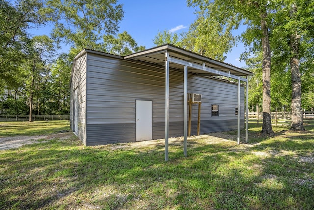 16070 Deer Pines Dr, Conroe, TX 77303 - view of outbuilding featuring a wall mounted air conditioner and a garage