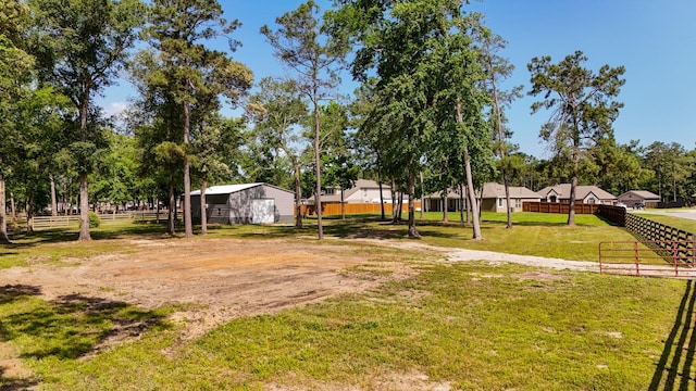 16070 Deer Pines Dr, Conroe, TX 77303 - view of yard with an outbuilding