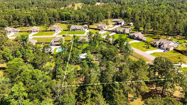 16070 Deer Pines Dr, Conroe, TX 77303 - aerial view of residential area featuring a forest and property boundaries highlighted