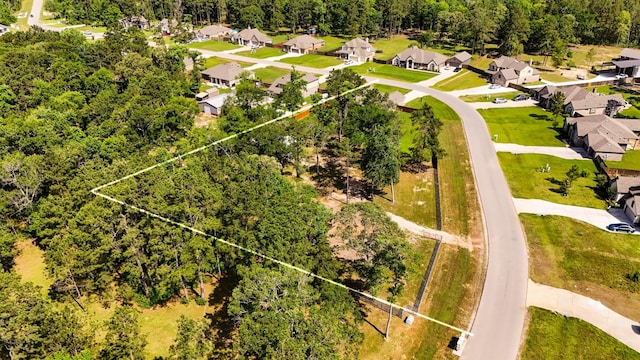 16070 Deer Pines Dr, Conroe, TX 77303 - aerial perspective of suburban area with property parcel outlined