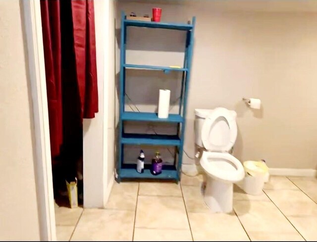 1811 S Brazos St, San Antonio, TX 78207 - bathroom with toilet and tile patterned floors