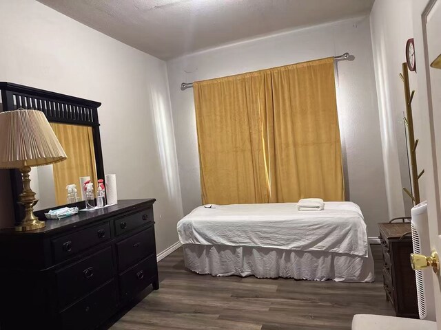 1811 S Brazos St, San Antonio, TX 78207 - bedroom featuring wood finished floors