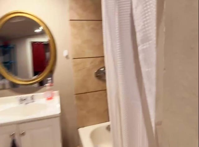 1811 S Brazos St, San Antonio, TX 78207 - bathroom featuring vanity and shower / bathtub combination with curtain