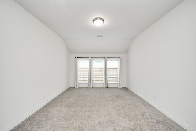 28430 Sycamore Falls Ln, Fulshear, TX 77441 - unfurnished room with vaulted ceiling and light carpet