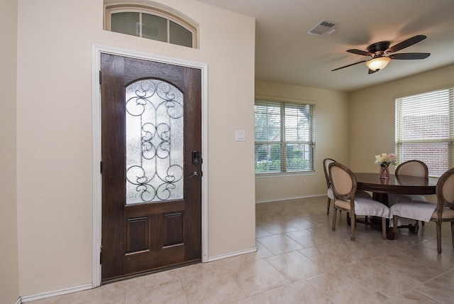 4302 Lisboa Cir, Katy, TX 77493 - foyer entrance with ceiling fan and light tile patterned flooring