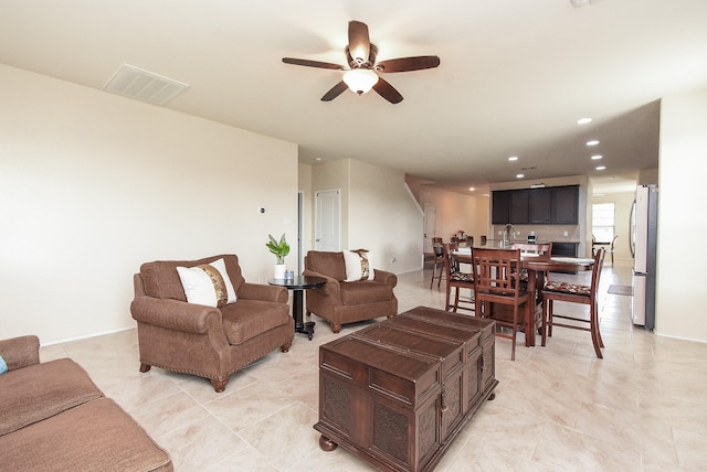 4302 Lisboa Cir, Katy, TX 77493 - living room featuring ceiling fan, light tile patterned flooring, and recessed lighting
