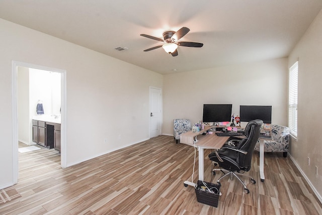 4302 Lisboa Cir, Katy, TX 77493 - office area with a ceiling fan and light wood finished floors
