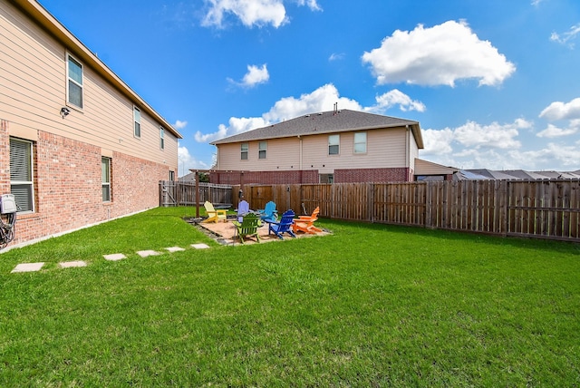 4302 Lisboa Cir, Katy, TX 77493 - fenced backyard featuring an outdoor fire pit
