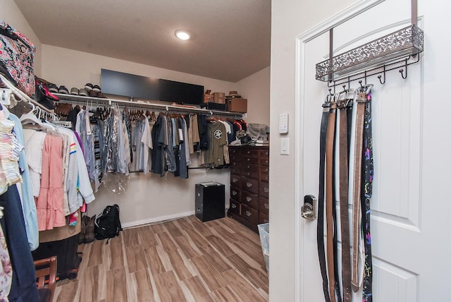 4302 Lisboa Cir, Katy, TX 77493 - walk in closet featuring wood finished floors