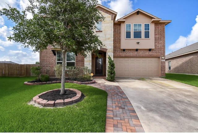 4302 Lisboa Cir, Katy, TX 77493 - view of front of property with an attached garage, driveway, brick siding, and stucco siding