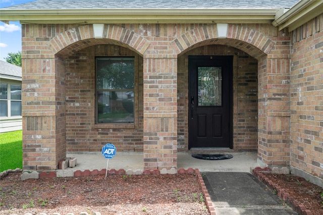 29418 Legends Hill Dr, Spring, TX 77386 - property entrance featuring brick siding and a shingled roof