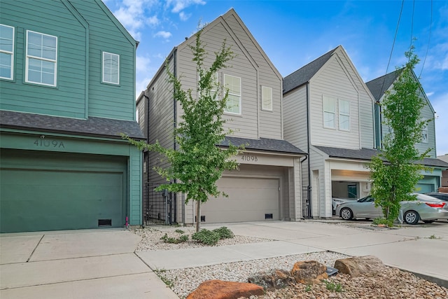 4109 Castor St Unit B, Houston, TX 77022 - traditional-style house with an attached garage, driveway, and roof with shingles