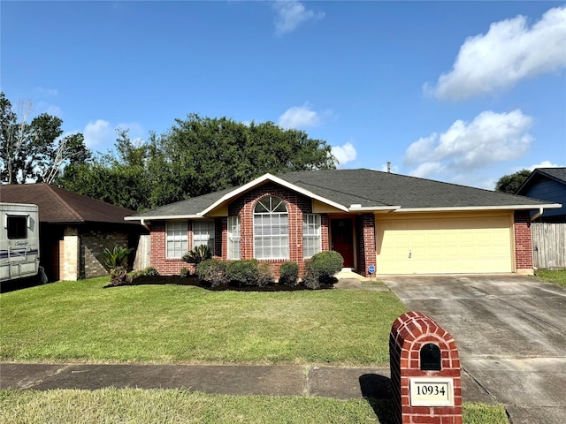 10934 Covered Bridge St, Houston, TX 77075 - ranch-style house featuring driveway, a garage, brick siding, and a front lawn