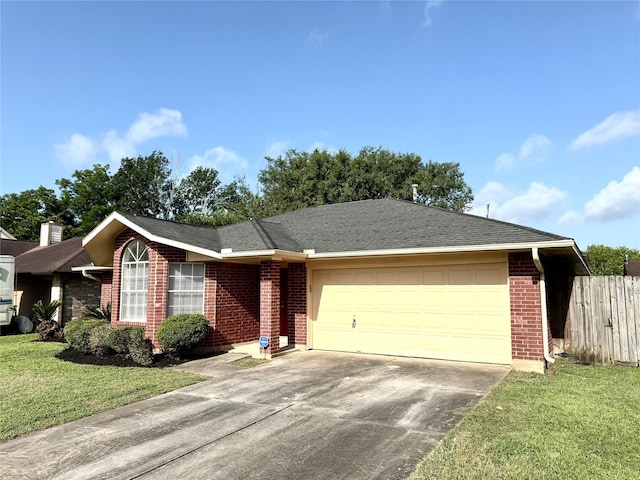 10934 Covered Bridge St, Houston, TX 77075 - single story home with brick siding, an attached garage, driveway, and a shingled roof