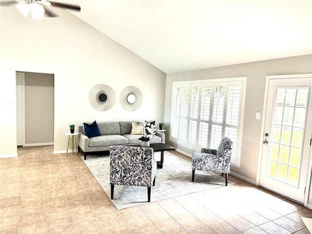 10934 Covered Bridge St, Houston, TX 77075 - living room featuring ceiling fan, tile patterned floors, and high vaulted ceiling