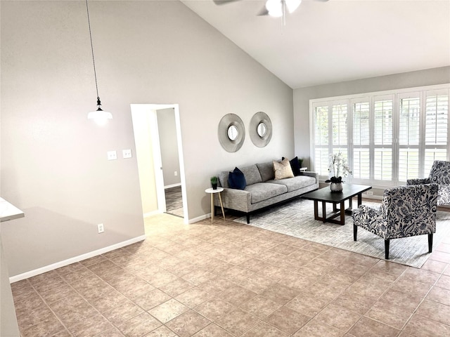 10934 Covered Bridge St, Houston, TX 77075 - living room with high vaulted ceiling, ceiling fan, and tile patterned floors