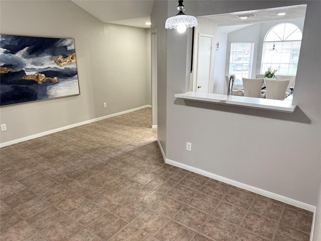 10934 Covered Bridge St, Houston, TX 77075 - dining room featuring baseboards and lofted ceiling
