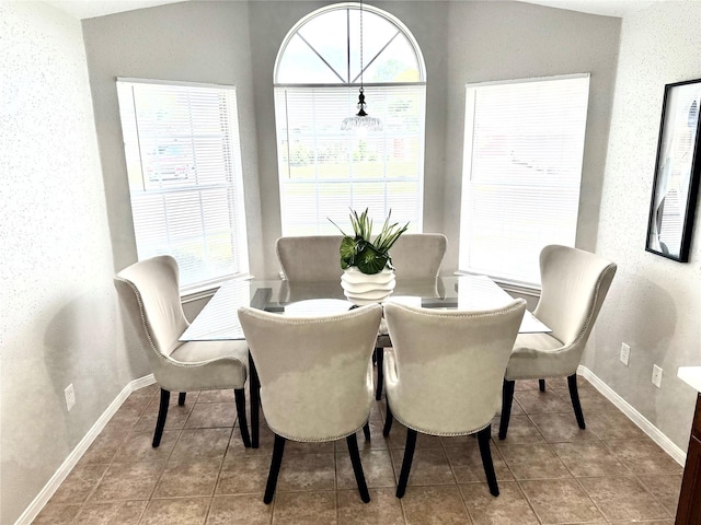 10934 Covered Bridge St, Houston, TX 77075 - dining space with tile patterned floors and baseboards