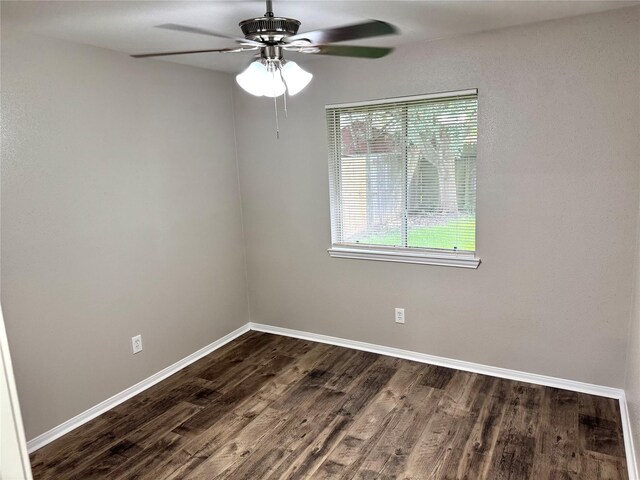 10934 Covered Bridge St, Houston, TX 77075 - empty room featuring dark wood-style floors and ceiling fan