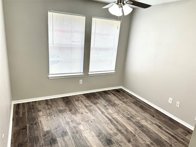 10934 Covered Bridge St, Houston, TX 77075 - empty room with ceiling fan and dark wood-style flooring