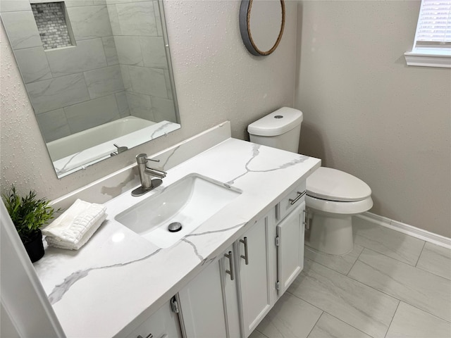 10934 Covered Bridge St, Houston, TX 77075 - full bathroom featuring marble look tile flooring and vanity