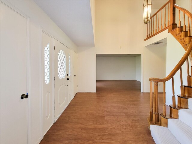 3 Thunderbird Cir, Baytown, TX 77521 - foyer entrance with stairs and wood finished floors