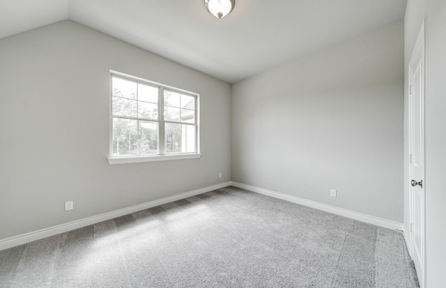 12611 Faded Sky Ct, Cypress, TX 77433 - spare room featuring carpet flooring and lofted ceiling