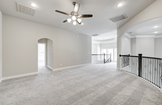 12611 Faded Sky Ct, Cypress, TX 77433 - unfurnished room featuring ceiling fan, carpet, arched walkways, recessed lighting, and crown molding